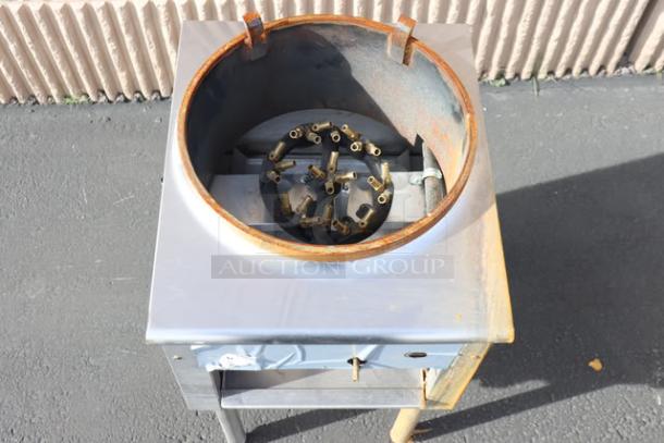 American Range Natural Gas Jet Wok Range, stainless steel, showing gas burners. Visible rust on edges, overall used condition.