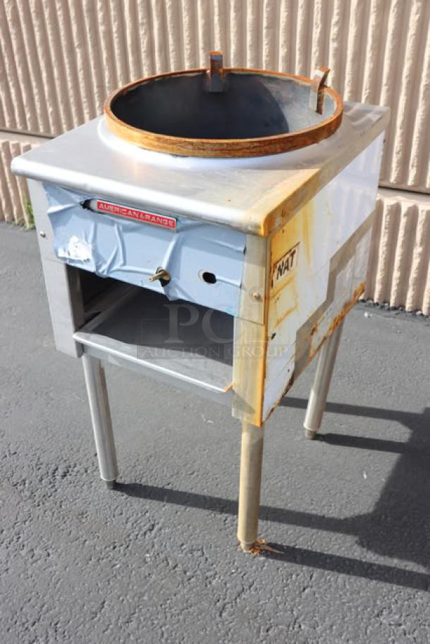 American Range Natural Gas Jet Wok Range with rust and wear, labeled "NAT," part of a combo lot auction.