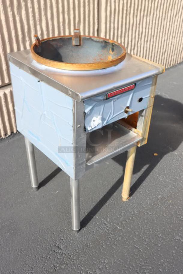 American Range Natural Gas Jet Wok Range with visible wear, including rust and scratches. Suitable for commercial use.