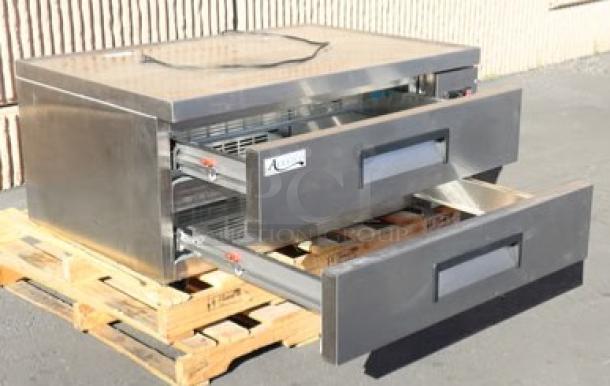 Avantco CBE-48-HC 48" 2 Drawer Refrigerated Chef Base on pallet. New, out of packaging, minor scratches and dents.