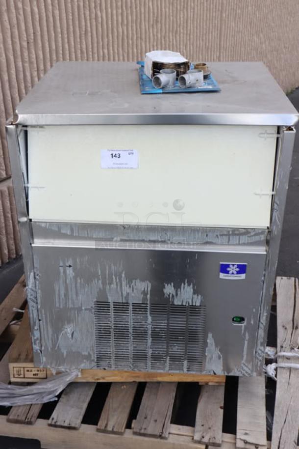 Brand new Manitowoc UNP0300A ice machine with 50 lb bin, scratch-n-dent condition, 325 lb capacity, air-cooled.