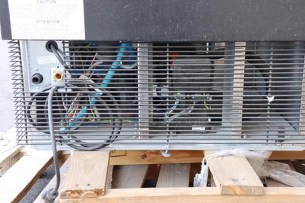 Manitowoc UNP0300A ice machine, air cooled, undercounter, 50 lb bin, 325 lb capacity, new scratch-n-dent, rear view.