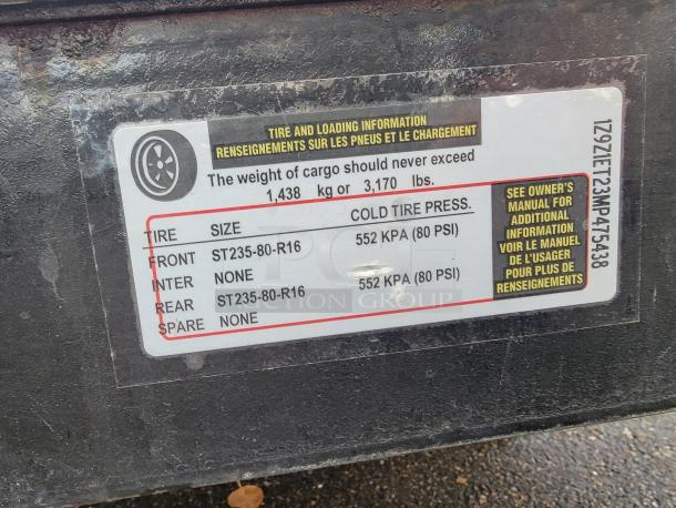 Tire and loading information label on trailer. Displays tire sizes: Front ST235-80-R16, Rear ST235-80-R16, Pressure: 552 KPA (80 PSI). VIN: 1Z9Z1ET23MP475438.