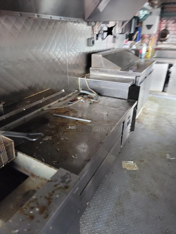 2021 16' Quality mobile kitchen trailer with Arctic Air units, dual fryer, flat-top griddle, and triple sink on diamond-plate floor.