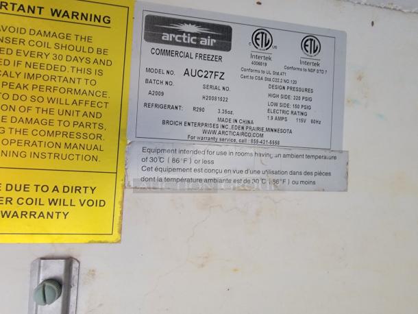 Arctic Air commercial freezer label in 2021 REEF/NBRHD mobile kitchen trailer, model AUC27FZ, details specs and usage warnings.