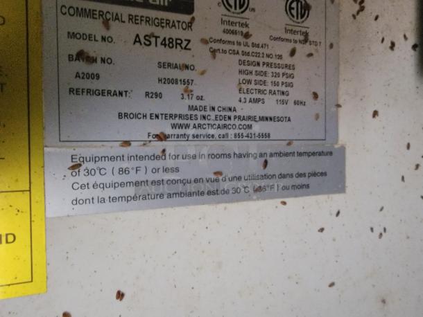 Commercial refrigerator label showing model AST48RZ, serial H20081557, refrigerant R290, designed for ≤30°C (86°F).