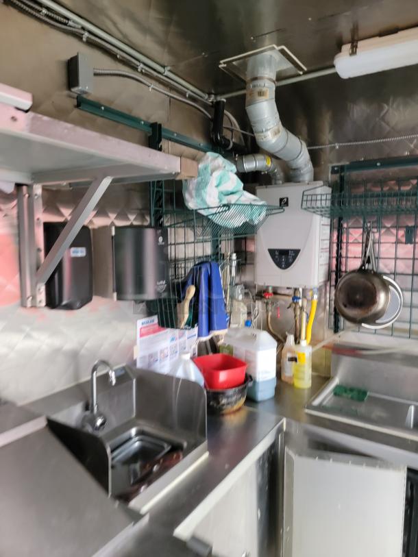 2021 Quality 16' mobile kitchen interior with sinks, Arctic Air units, and sturdy construction. Ready for relaunch. VIN: 1Z9Z1ET23MP475438.