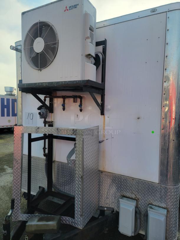 2019 Diamond Cargo 16' food trailer with Mitsubishi Electric HVAC unit and protective metal casing on exterior.