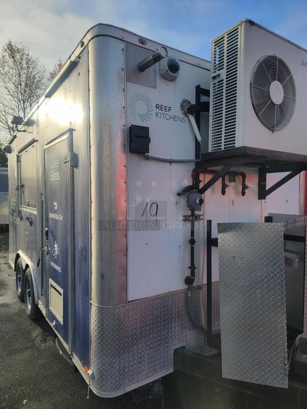 2019 Diamond Cargo 16' food trailer, former REEF Kitchens unit. Features HVAC, branded with REEF Kitchens and delivery logos.