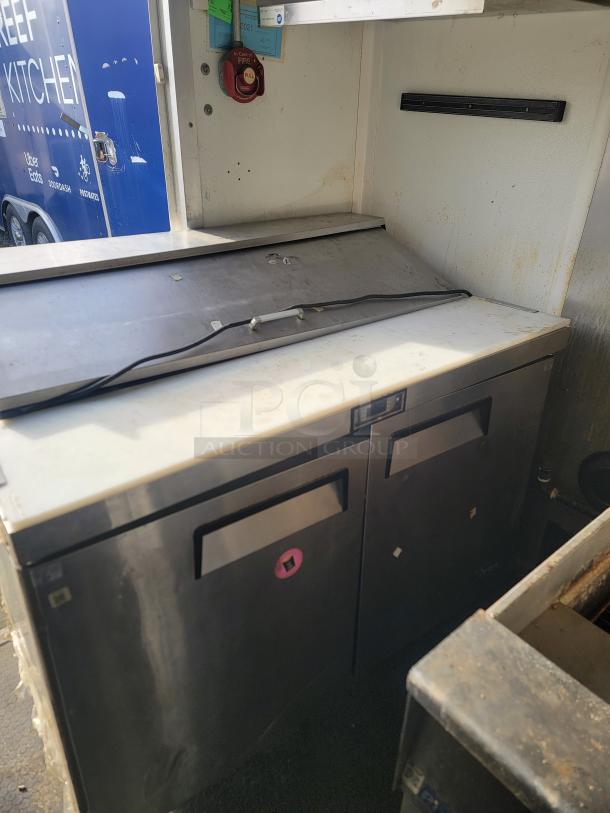 2019 Diamond Cargo 16' Ghost Kitchen Trailer, stainless steel prep area, visible electrical outlet, and fire safety features.