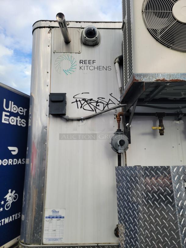 2019 Diamond Cargo 16' food trailer, exterior view. Features REEF KITCHENS branding and mounted equipment.