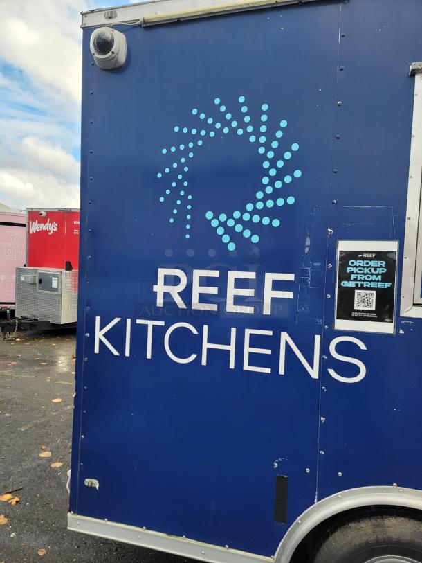 2019 Diamond Cargo 16' food trailer, blue with "REEF KITCHENS" logo, features security camera.