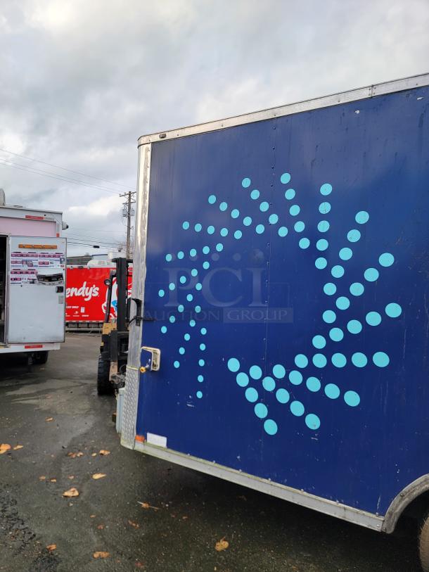 2019 Diamond Cargo 16' food trailer, blue with dot design, tandem-axle, turnkey, fully equipped for cooking, visible security cameras.