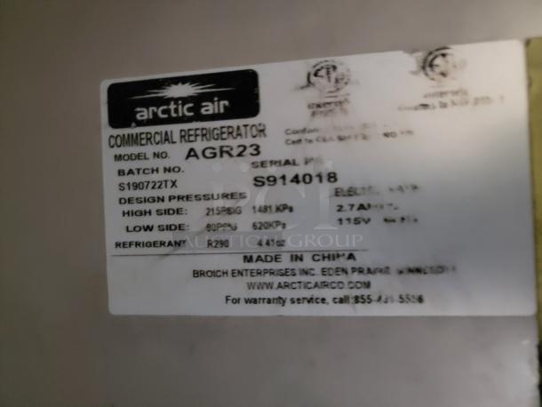 Label on Arctic Air AGR23 commercial refrigerator. Shows model, batch, serial number, design pressures, and R290 refrigerant.