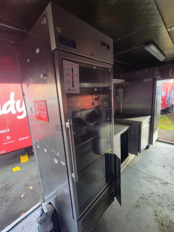 2020 Diamond Cargo 16' food trailer interior with commercial Arctic Air refrigerator, prep counters, and robust electrical system.