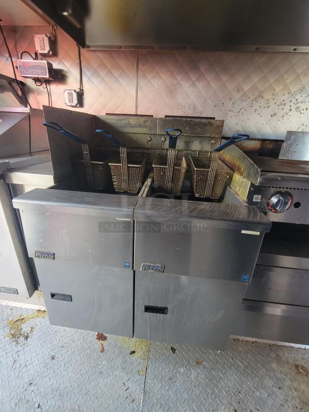 2020 Diamond Cargo 16' food trailer interior, featuring Pitco deep fryers, stainless steel appliances, and gas setup.