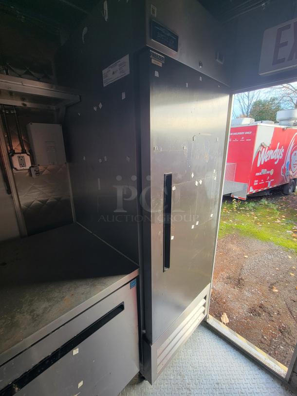 2020 Diamond Cargo 16' food trailer interior with commercial freezer and appliances. Well-maintained, ready for operation.