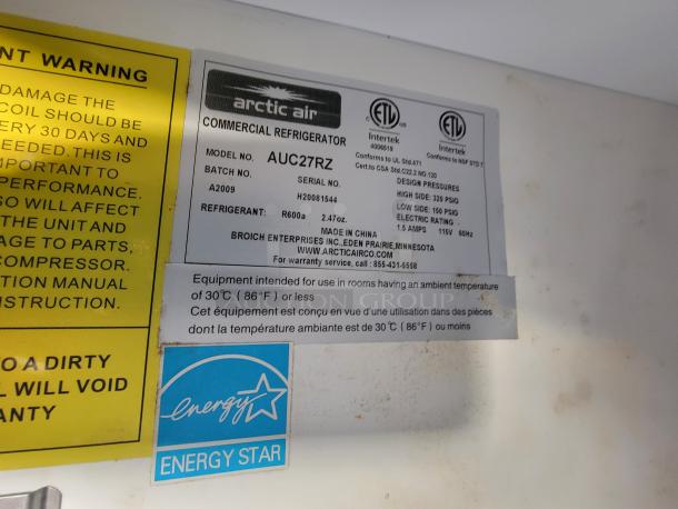 Arctic Air commercial refrigerator label showing model AUC27RZ, Energy Star rating, and operating specs.