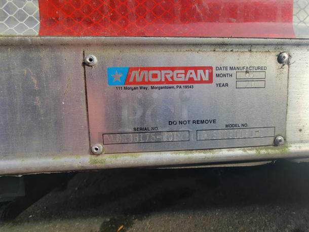 Morgan trailer identification plate showing serial number MOR06175-001, model GVSDS91161802, manufactured 06/20.