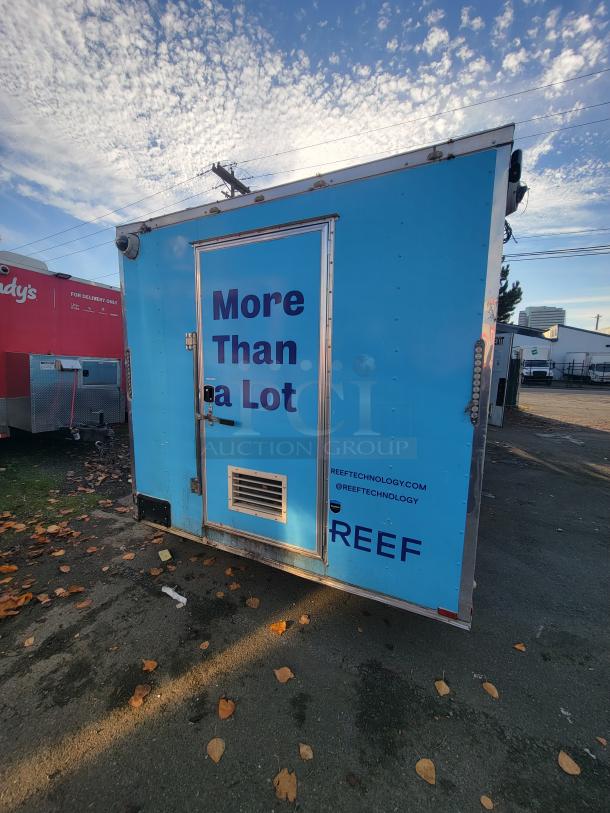 2019 Quality 24' food trailer with blue exterior, labeled "More Than a Lot," equipped with top commercial appliances.