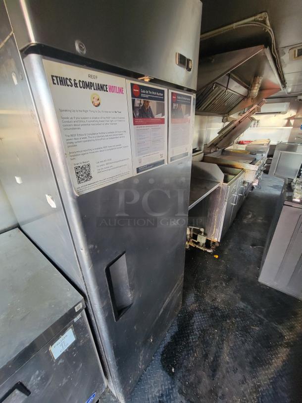 2019 Quality 24' food trailer interior with Royal Range fryers, griddle, and multiple refrigeration units visible.