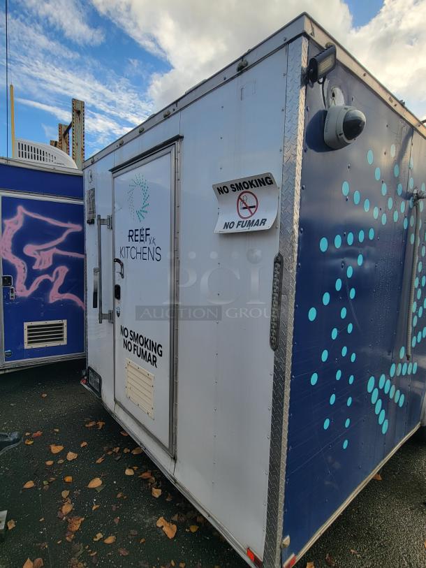 2019 24' Quality commercial food trailer with "REEF Kitchens" and "No Smoking" signs, featuring stainless steel interior and professional-grade kitchen equipment.