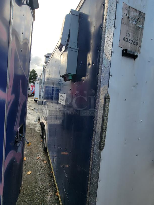 2019 Quality 24' food trailer, blue exterior, electrical panel, mobile food service permit, ready for business.