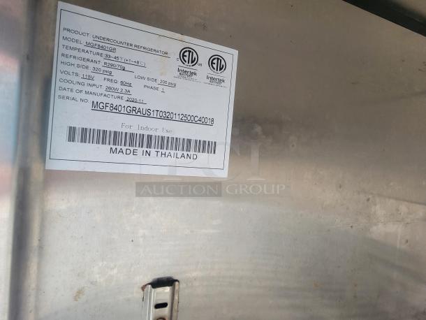 Label for undercounter refrigerator, Model MGF8401GR, shows temperature range, power details, and "Made in Thailand" mark.