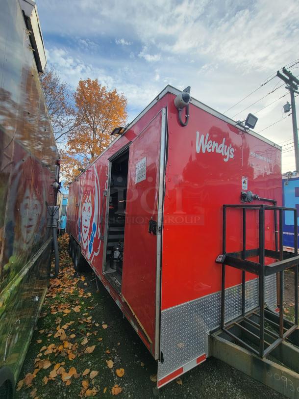 2021 Wendy's Mobile Ghost Kitchen, 28' trailer, bright red with logo, fully equipped for high-volume food service.