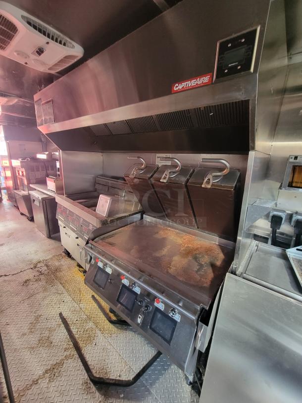 2021 Wendy's Mobile Ghost Kitchen trailer with CaptiveAire hood, high-end commercial appliances, and triple axle design.