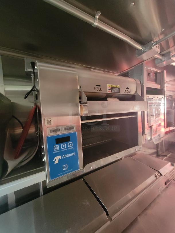 2021 Wendy's Mobile Ghost Kitchen trailer interior with Antunes commercial toaster, stainless steel finish, like-new condition.