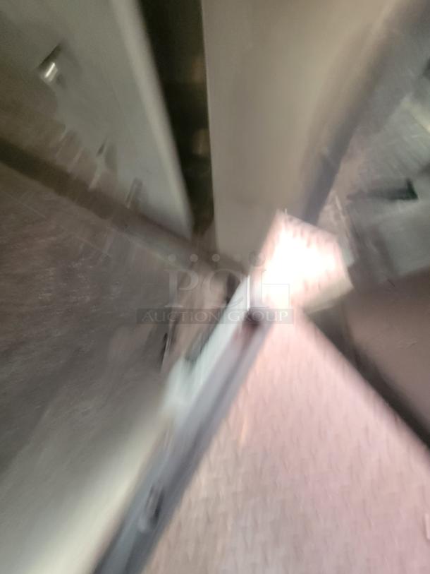 Blurry interior view of a 2021 28' Wendy's mobile ghost kitchen trailer. Key features not visible in image.