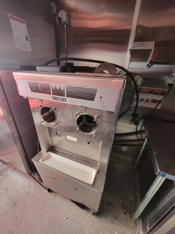 Taylor commercial frozen dessert machine, stainless steel, in excellent condition, in a high-end 2021 mobile kitchen trailer.