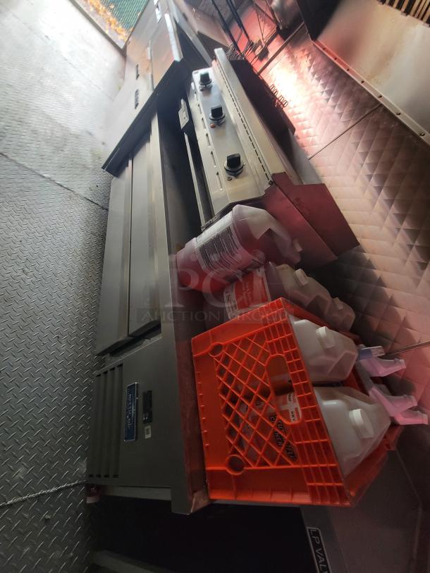 2021 24' Quality Kitchens mobile food trailer interior; includes Imperial deep fryers, gas griddle, Arctic Air fridge.