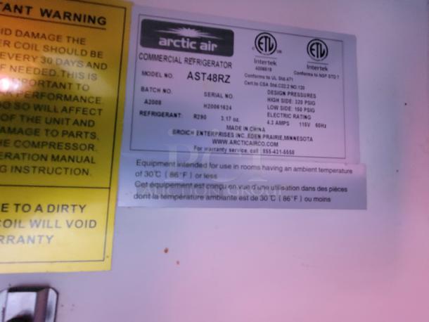 Arctic Air commercial refrigerator label indicating model AST48RZ, serial H20261424, 115V, made in China.