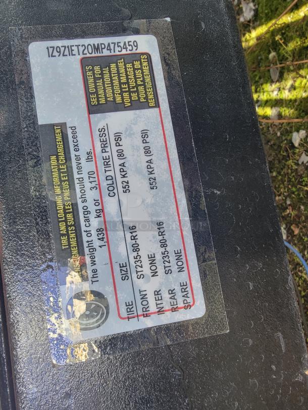 Tire and load information tag for Quality 24' Food Trailer, VIN: 1Z9Z1ET20MP475459. Shows tire sizes and cold pressure details.