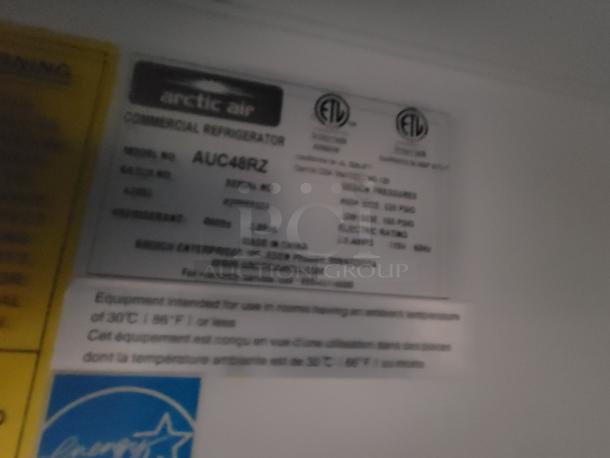 Arctic Air AUC48RZ Commercial Refrigerator label shows ETL certification, model, serial number, electric rating, made in China.