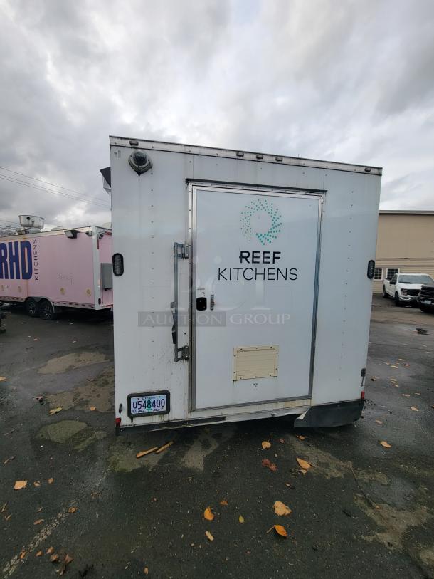 2020 Rock Solid 16' mobile trailer ghost kitchen with "Reef Kitchens" signage, Oregon license plate U548400 visible.