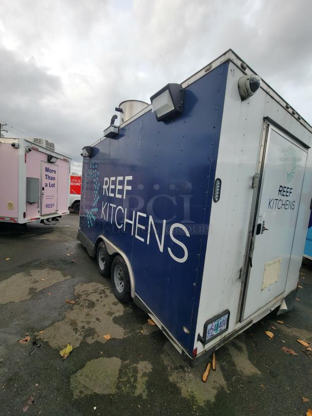 2020 Rock Solid 16' mobile trailer, exterior blue with "REEF KITCHENS" logo, ready for ghost kitchen operations.