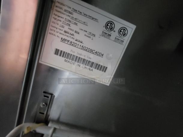 Label on a commercial Atosa prep table (Model MPF8201), showing ETL certification, manufacturing details, and serial number.