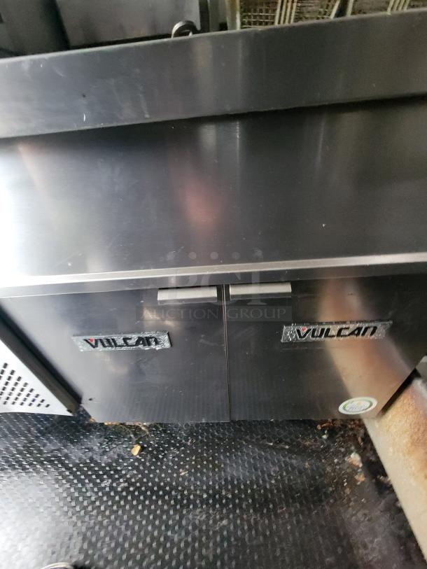 2020 Rock Solid 16' mobile kitchen trailer interior, featuring Vulcan electric countertop fryer, stainless steel surfaces.