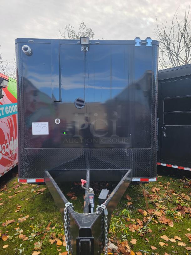 2021 24' SDG refrigerated trailer, black exterior, two axles, 14,000 LB GVWR, front hitch view, VIN: 4S9S1EH29MW364547.