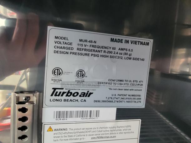 Turbo Air label on commercial cooler in SDG trailer, model MUR-48-N, 115V, R-290 refrigerant, 6.5 amps. Made in Vietnam.