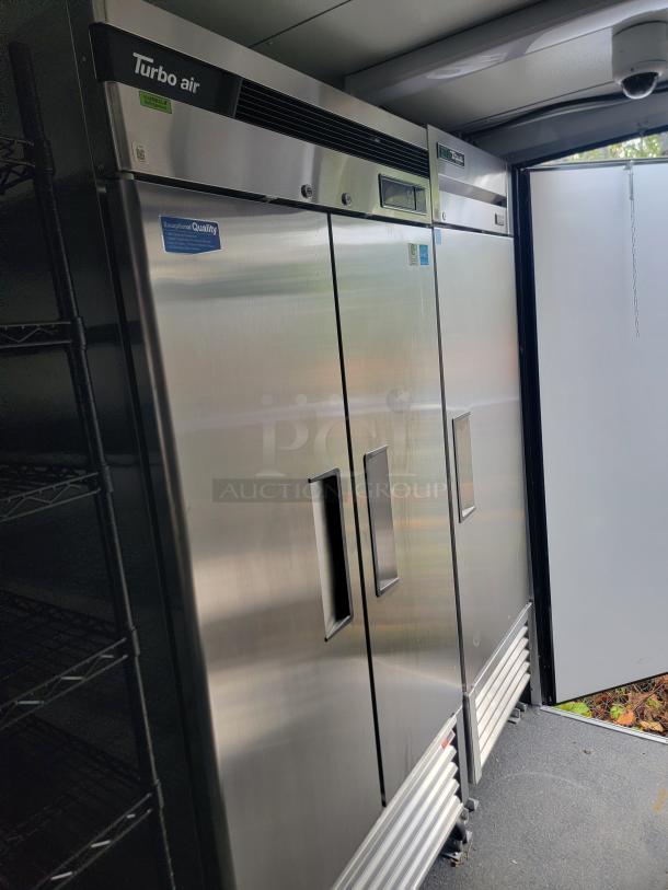 2021 SDG refrigerated trailer interior, featuring Turbo Air cooler with stainless steel finish, chrome wire shelving.