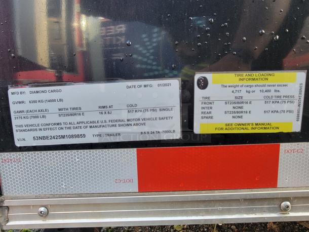 2021 Diamond Cargo 24' trailer label with GVWR of 14,000 lbs, tire info, manufacturing date, and VIN: 53NBE2425M1089859.