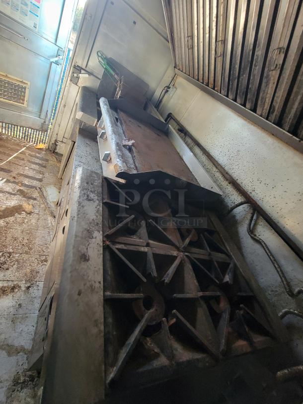 2007 Ford Utilimaster food truck interior showing commercial stove, grill, and stainless steel kitchen fixtures.