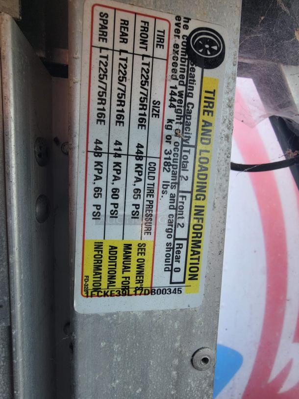 2007 Ford Utilimaster food truck tire and loading sticker. Includes size, pressure info, and VIN 1FCKE39L17DB00345.