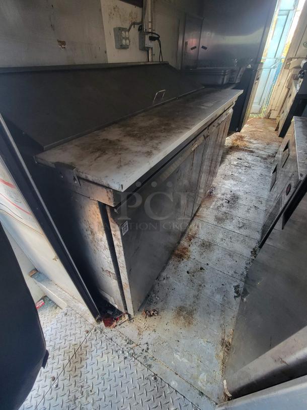 2007 Utilimaster Pro-Kitchen food truck interior, showing worn high-end kitchen equipment needing restoration.