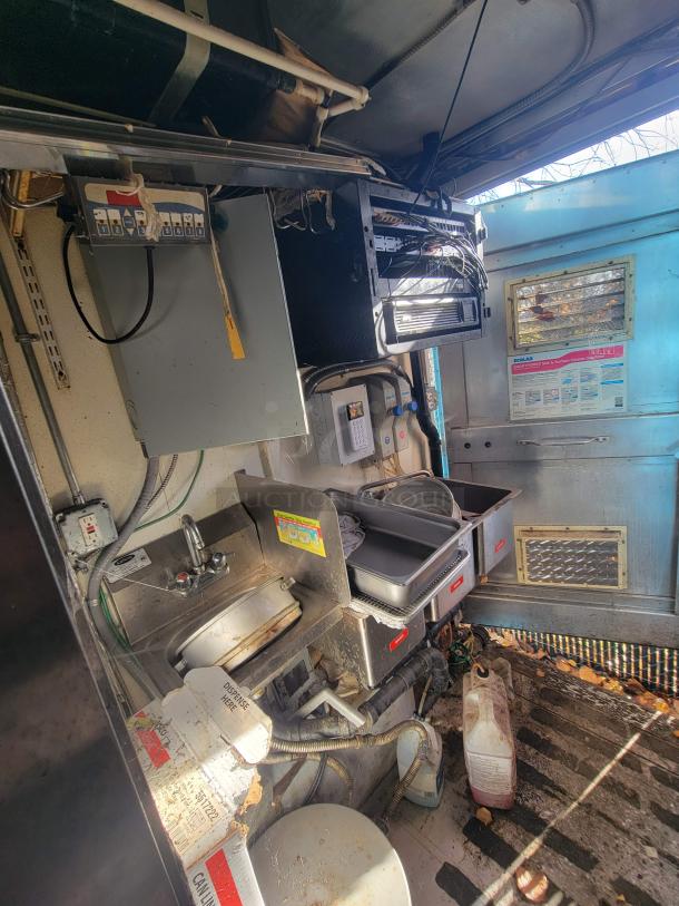 2007 Utilimaster Pro-Kitchen Food Truck interior. Features high-end kitchen equipment. Needs restoration. VIN: 1FCKE39L17DB00345.