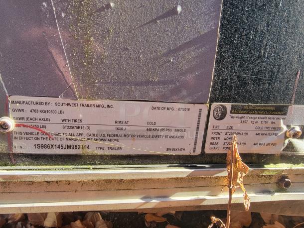2018 STM 14-Foot Concession Trailer label showing GVWR 10500 lb, GAWR 6250 lb, VIN 1S986X145JM982184, manufacture date 07/2018.